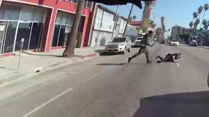 The confrontation between an LAPD officer and suspect Nathaniel Pinnock is captured on an officer's body camera freeze frame. (Credit: LAPD)