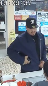 Detectives are seeking the man pictured in this surveillance photo in connection with an armed robbery at a Montebello donut shop on Jan. 27, 2020. (Credit: Montebello Police Department)