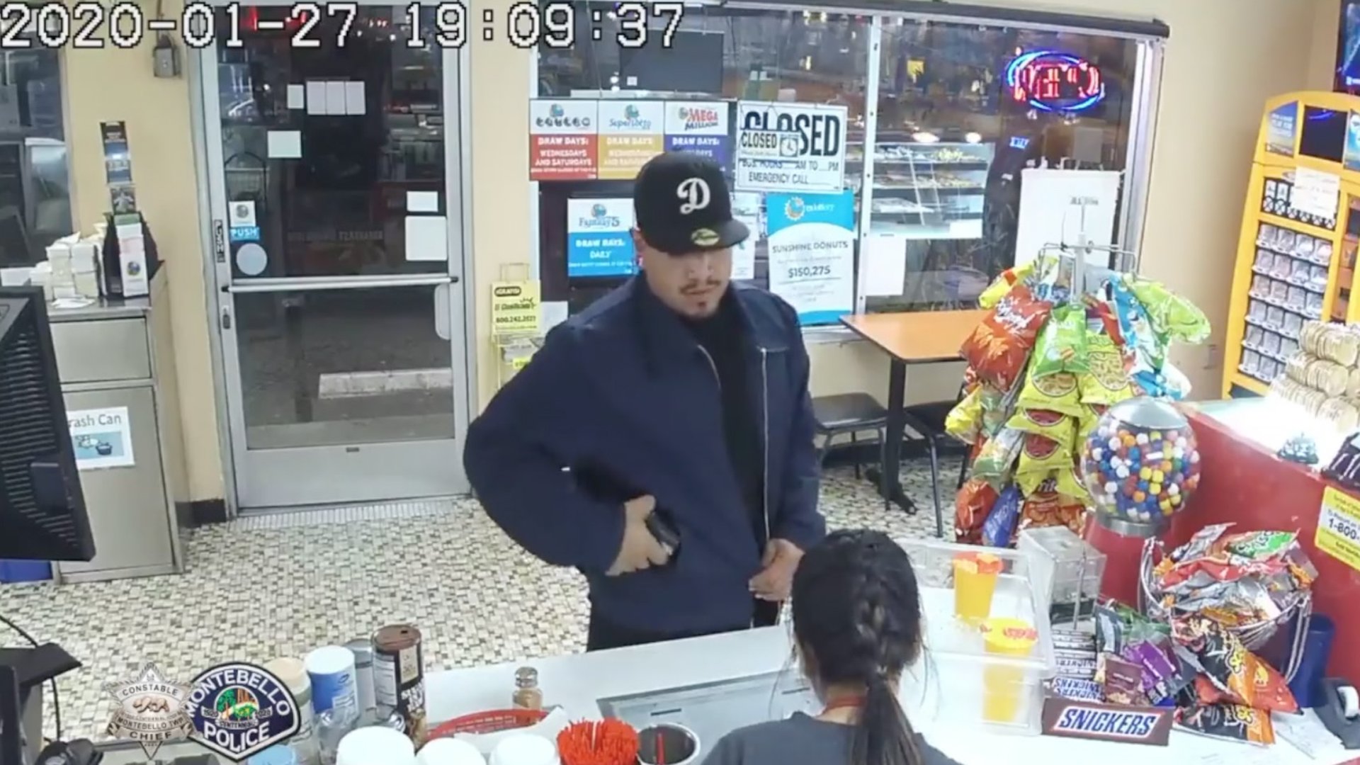 Detectives are seeking the man pictured in this surveillance photo in connection with an armed robbery at a Montebello donut shop on Jan. 27, 2020. (Credit: Montebello Police Department)