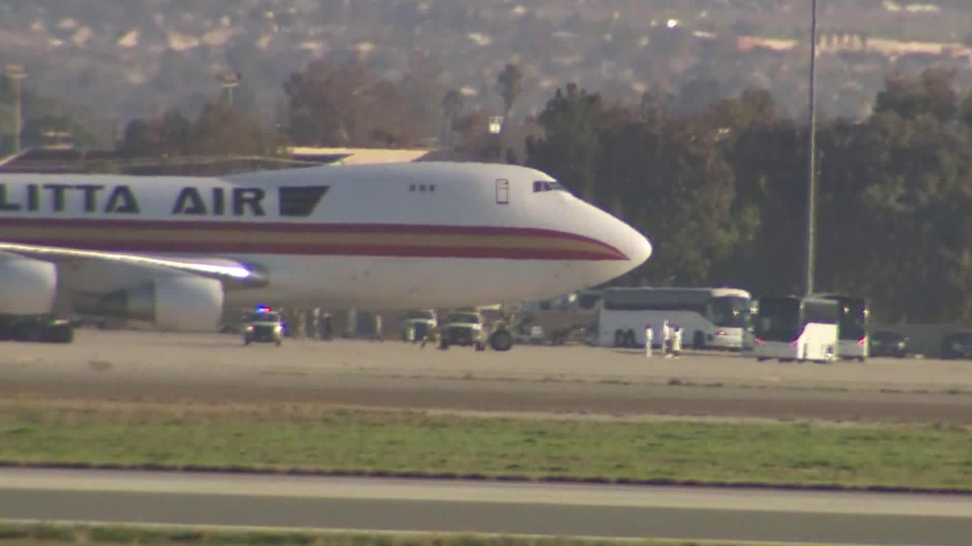 A plane carrying about 200 Americans out of Wuhan, China, arrived at March Air Reserve Base on Jan. 29, 2020. (Credit: KTLA)