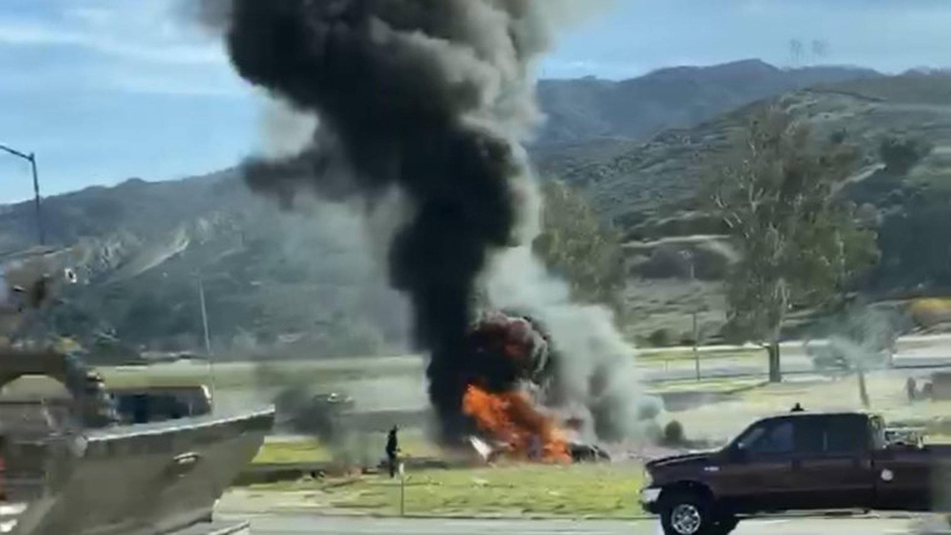 A small plane burning after crashing in Santa Clarita on Jan. 4, 2019, is seen in a photo shared by KTLA viewer Julia Morales.