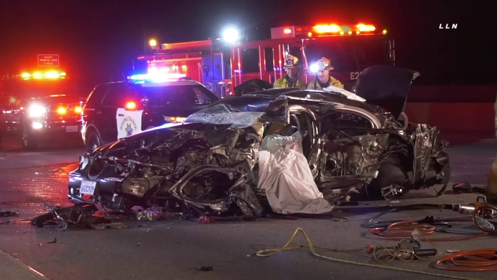 Authorities assess the scene of a deadly wrong-way crash on the 405 Freeway near Getty Center Drive on Feb. 16, 2020. (Credit: KTLA)