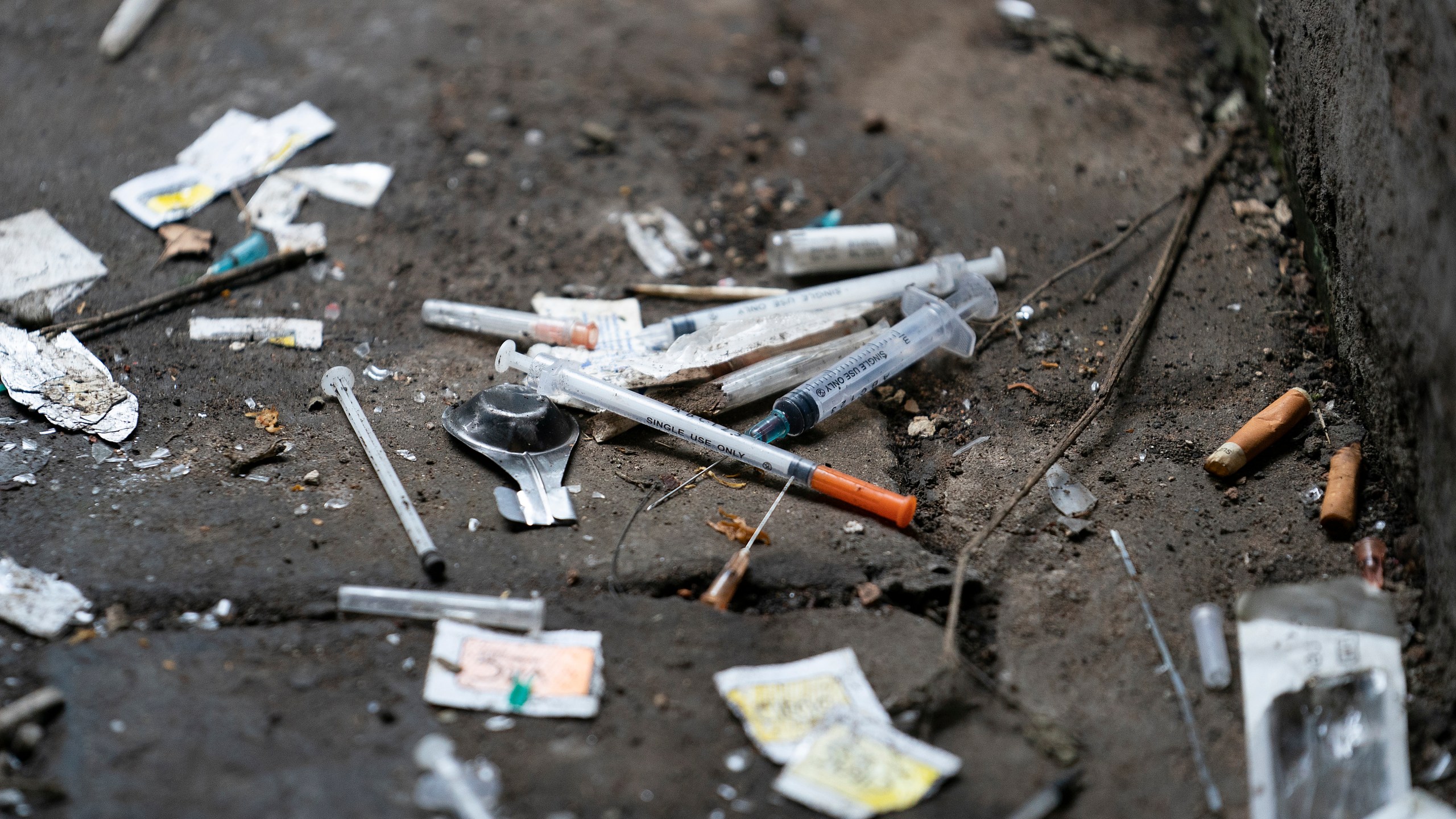 Syringes and paraphernalia used by drug users litter an alley on Dec. 06, 2018, in Walsall, England. (Christopher Furlong/Getty Images)