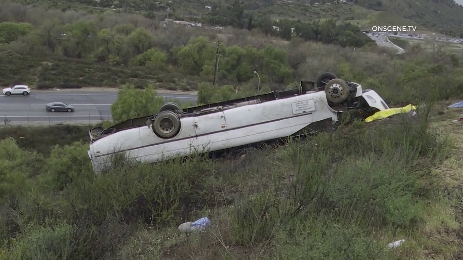 Three people died and 18 were hurt when a charter bus overturned near San Diego on Feb. 22, 2020. (Credit: OnScene)