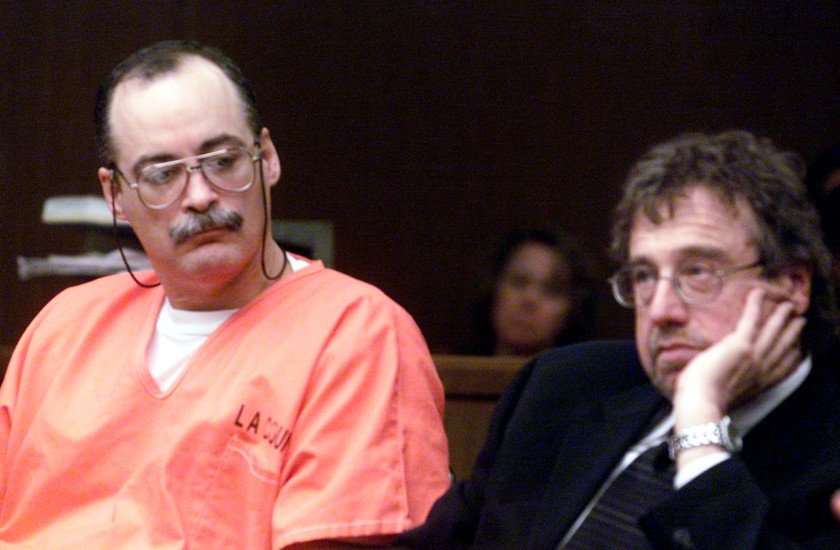 Sitting inside San Fernando Superior Court, defendant Kenneth E. Gay appears alongside his attorney, Kenneth Lezin, in 2000. Gay was given a death sentence at the time.(Credit: Boris Yaro / Los Angeles Times)