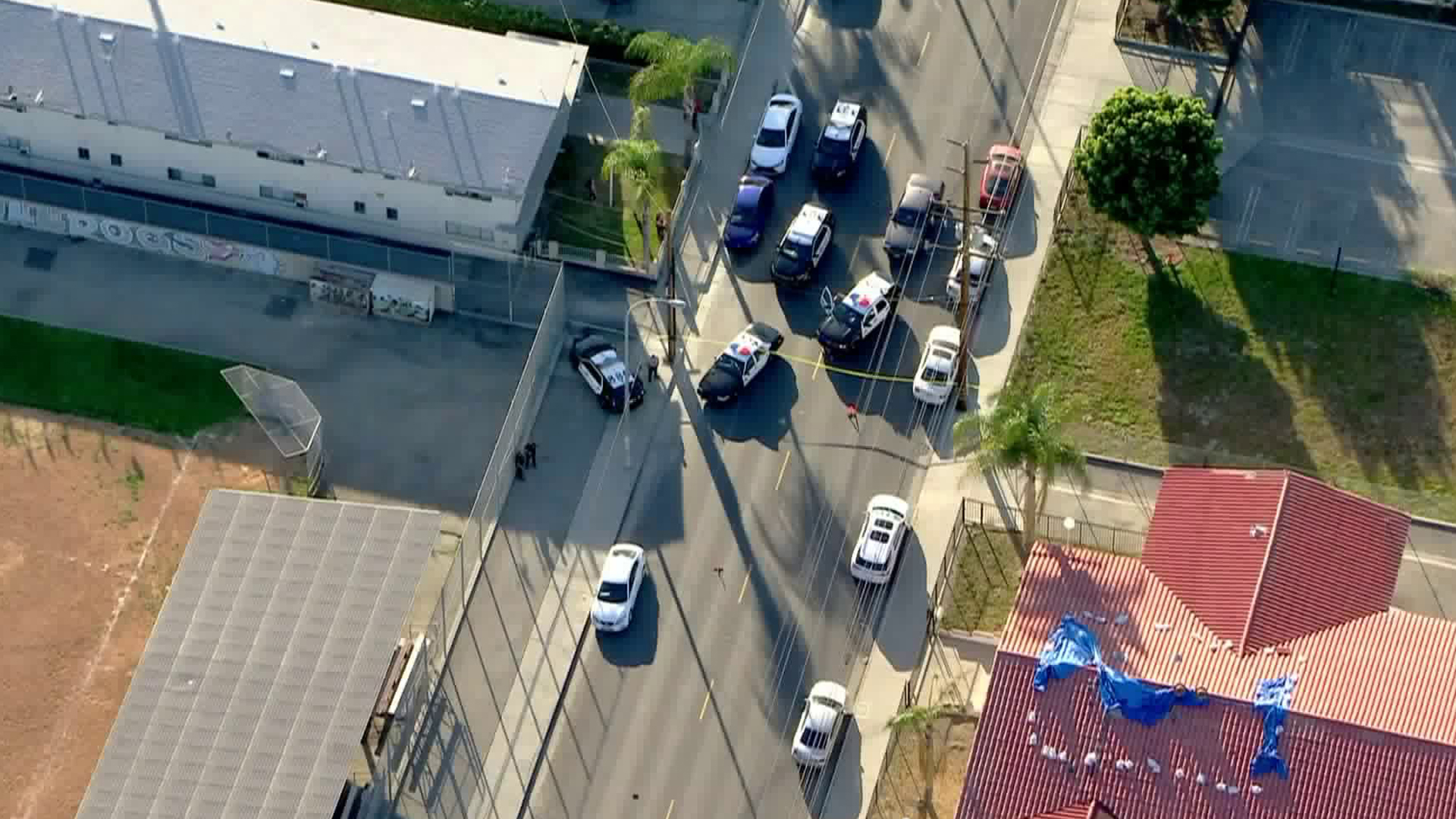 Authorities respond to a deadly shooting outside a school in Cudahy on Feb. 25, 2020. (Credit: KTLA)