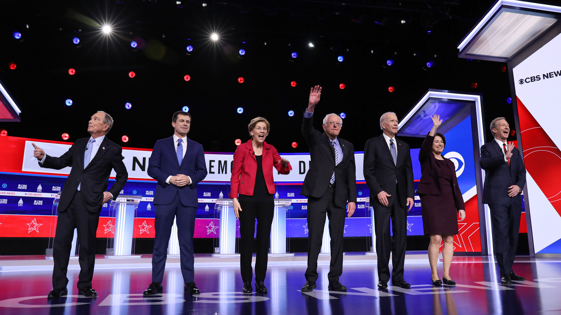 Democratic presidential hopefuls, from left, former New York Mayor Mike Bloomberg, former mayor of South Bend, Indiana, Pete Buttigieg, Sen. Elizabeth Warren, Sen. Bernie Sanders, former Vice President Joe Biden, Sen. Amy Klobuchar and billionaire activist Tom Steyer arrive to participate in the tenth Democratic primary debate in Charleston, South Carolina, on Feb. 25, 2020. (Credit: Logan Cyrus / AFP / Getty Images)