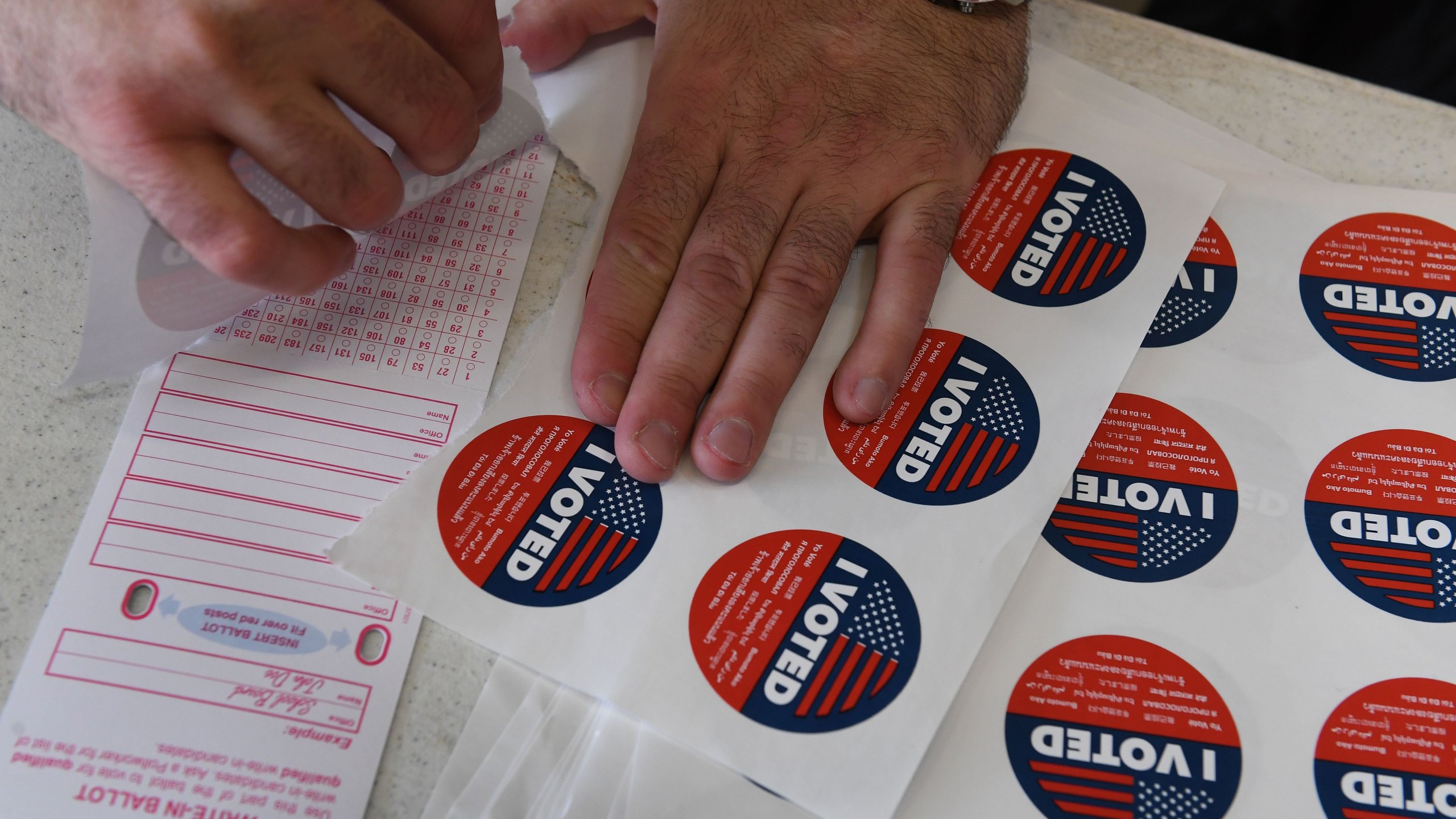 "I voted" stickers are displayed at a polling site in Venice Beach on Nov. 6, 2018. (Credit: Mark Ralston / AFP / Getty Images)