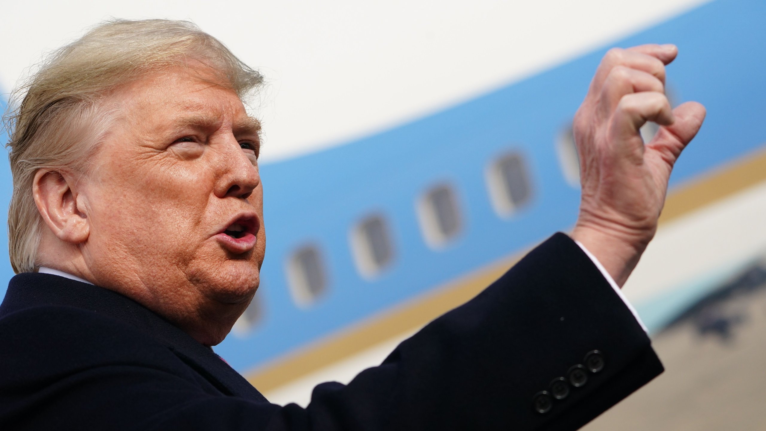 President Donald Trump speaks to press before boarding Air Force One at Joint Andrews Base in Maryland on Feb. 18, 2020. (Credit: Mandel Ngan / AFP / Getty Images)