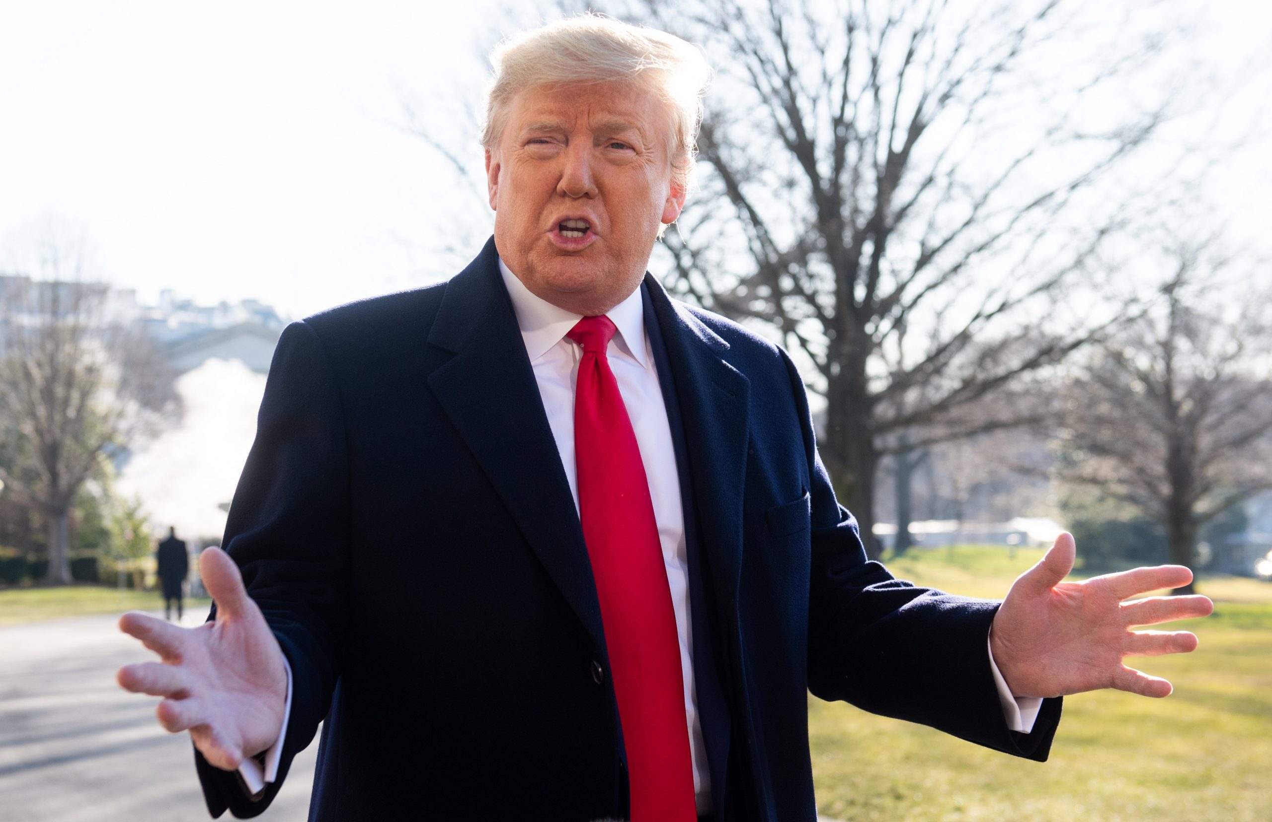 Donald Trump speaks to the press prior to departing on Marine One from the South Lawn of the White House on Feb. 23, 2020. (Credit: SAUL LOEB/AFP via Getty Images)