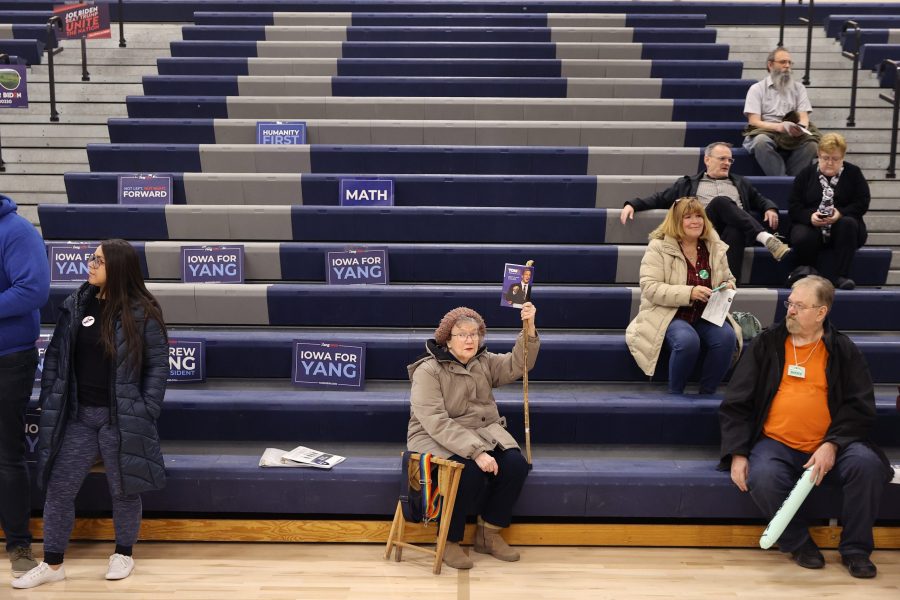 Supporters of Democratic presidential candidate Tom Steyer prepare to caucus at Roosevelt High School Feb. 03, 2020 in Des Moines, Iowa. (Credit: Chip Somodevilla/Getty Images)