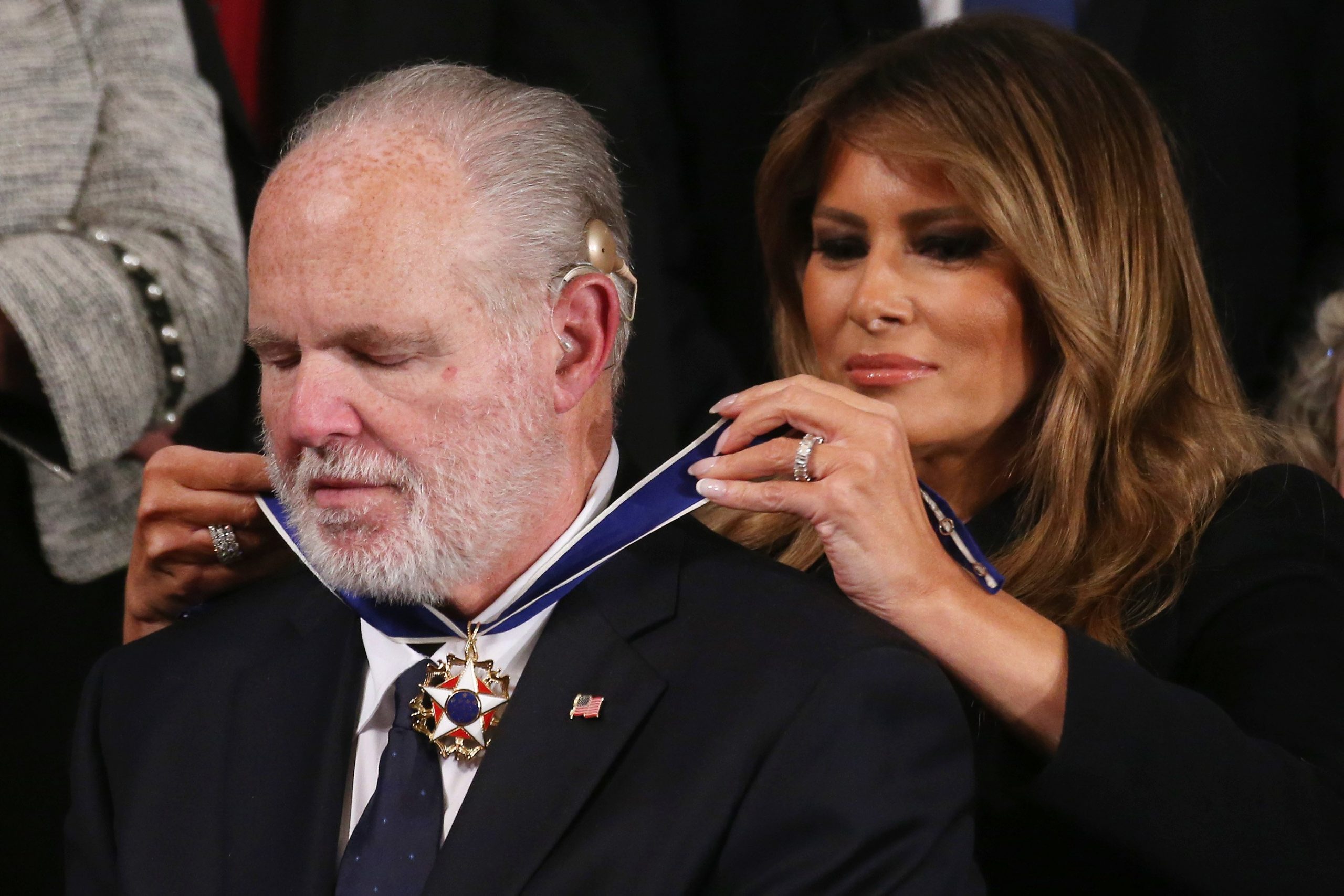 Radio personality Rush Limbaugh reacts as first lady Melania Trump gives him the Presidential Medal of Freedom during the State of the Union address on Feb. 4, 2020. (Credit: Mario Tama / Getty Images)