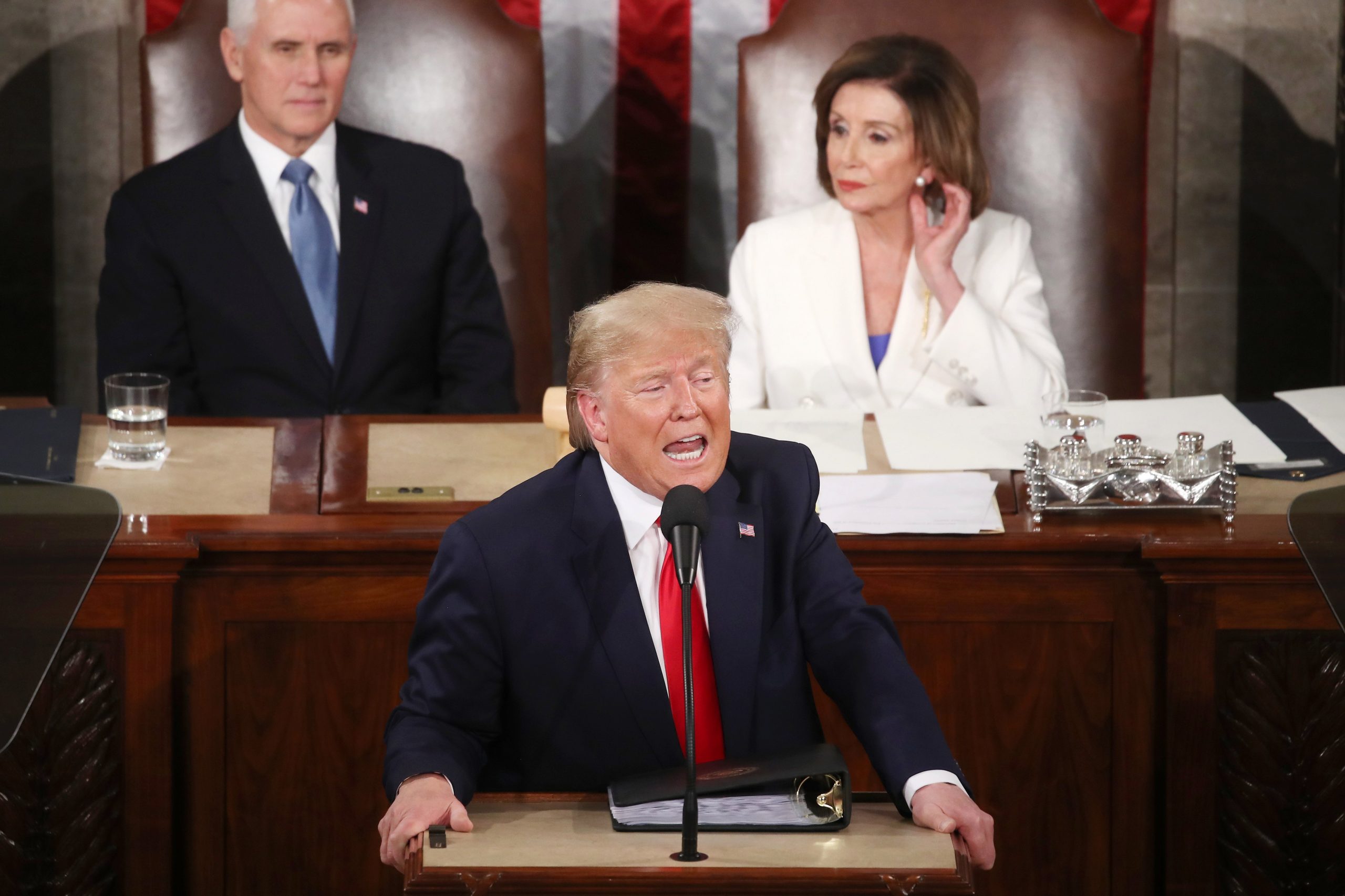 President Donald Trump delivers the State of the Union address as House Speaker Nancy Pelosi and Vice President Mike Pence look on, Feb. 4, 2020. (Credit: Mark Wilson / Getty Images)