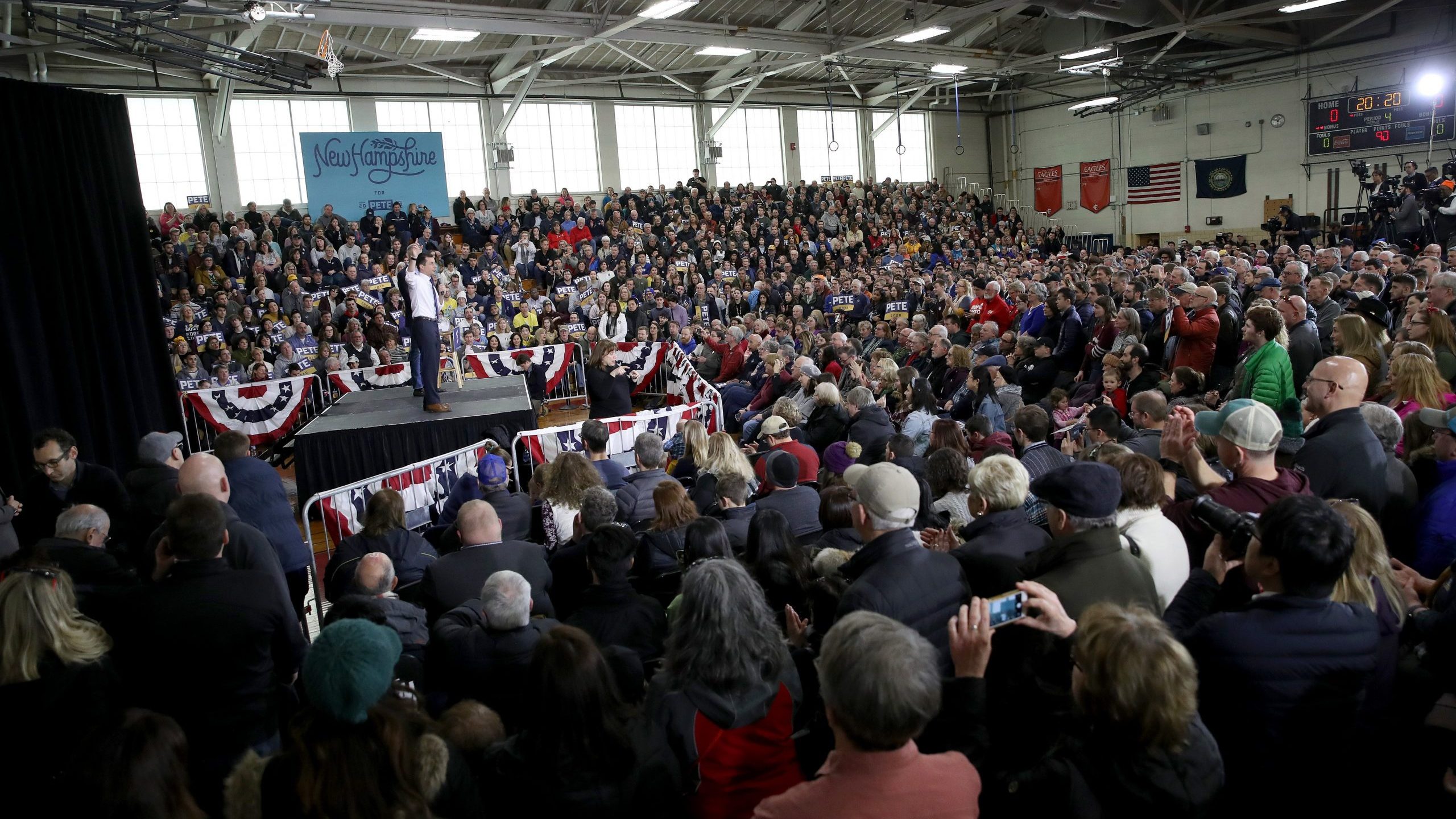 Members of the audience listen as Democratic presidential candidate former South Bend, Indiana Mayor Pete Buttigieg speaks at a Get Out the Vote rally on Feb. 9, 2020, in Nashua, New Hampshire. (Credit: Win McNamee/Getty Images)