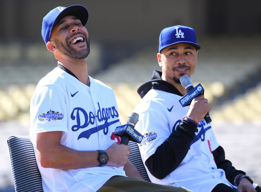 David Price #33 and Mookie Betts #50 of the Los Angeles Dodgers answer questions from the media during an introductory press conference at Dodger Stadium on Feb. 12, 2020. (Credit: Jayne Kamin-Oncea/Getty Images)