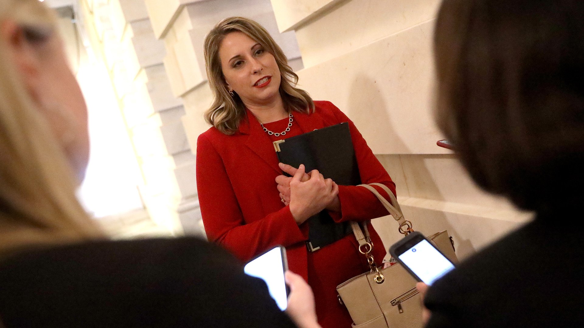 Rep. Katie Hill answers questions from reporters at the U.S. Capitol following her final speech on the floor of the House of Representatives on Oct. 31, 2019. (Credit: Win McNamee / Getty Images)