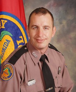 Trooper Joseph Bullock is seen in a photo released by the Florida Highway Patrol. 