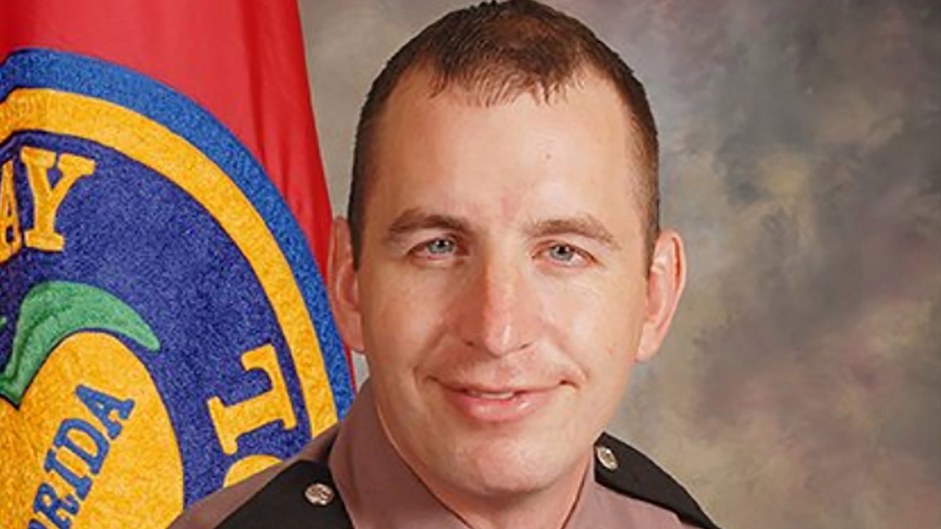 Trooper Joseph Bullock is seen in a photo released by the Florida Highway Patrol.