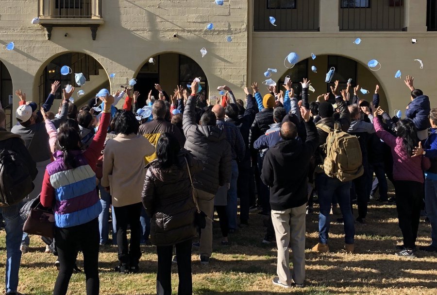 Americans evacuated from China celebrate the end of their 14 day quarantine at March Air Reserve Base. (Credit: Dr. Cameron Kaiser)