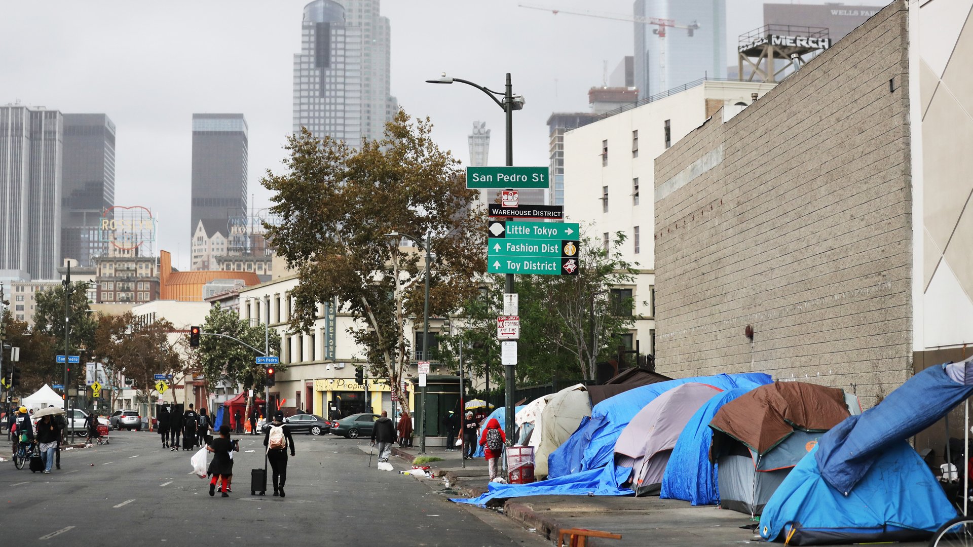 People walk in Los Angeles’ Skid Row on Sept. 28, 2019. (Mario Tama / Getty Images)