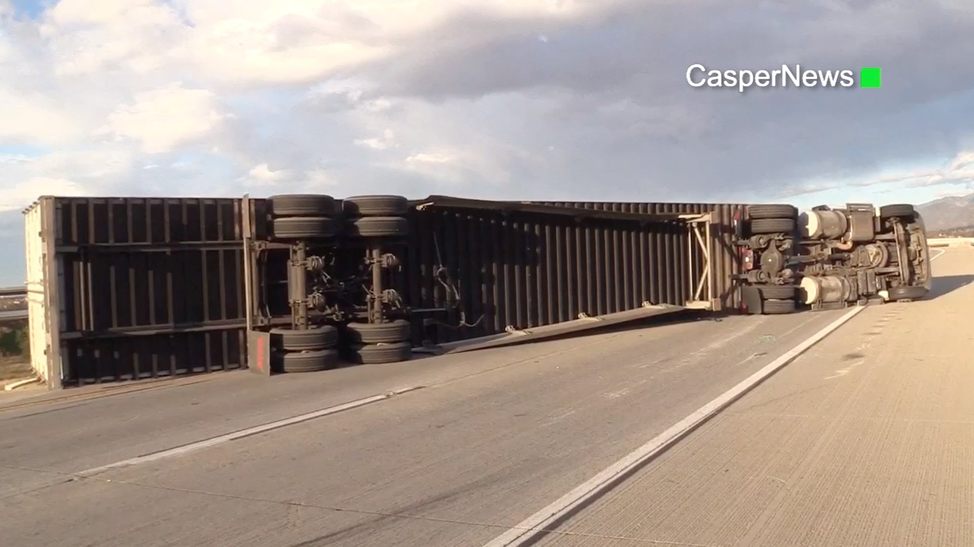 Powerful winds blew over a big rig hauling more than two tons of furniture in the Fontana area on Feb. 10, 2020. (Credit: CasperNews)