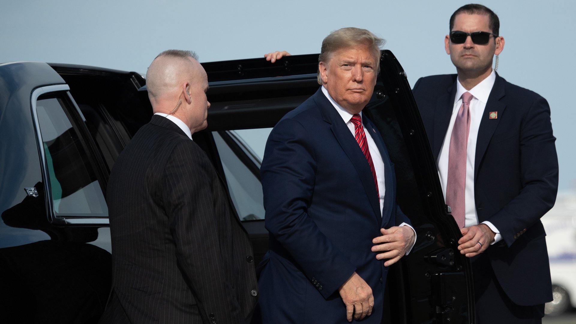 US President Donald Trump walks to board Air Force One prior to departure from Daytona Beach International Airport in Daytona Beach, Florida, February 16, 2020. (Credit: SAUL LOEB/AFP via Getty Images)