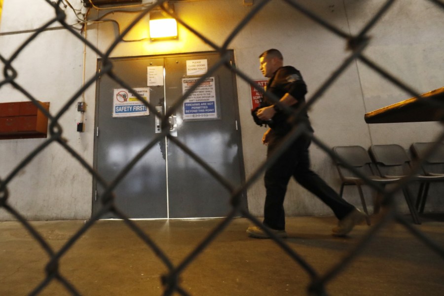 All officers were issued protective masks over the last few weeks. Dvid Marin, seen on March 16, 2020, kept packets of hand sanitizer in his car. (Al Seib/Los Angeles Times)