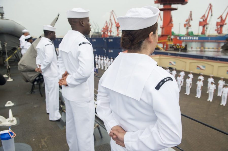 Sailors aboard the Arleigh Burke-class guided-missile destroyer USS Benfold (DDG 65) man the rails while pulling in for a port visit in China on Aug. 8, 2016. (U.S. Navy/Mass Communication Specialist 3rd Class Deven Leigh Ellis)