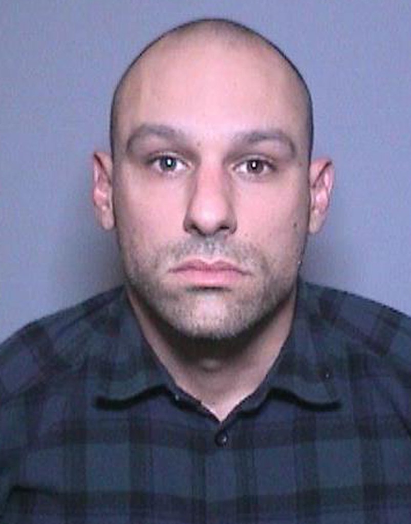 Michael Medeiros is seen in a booking photo released by the Orange County Sheriff's Department on March 13, 2020.