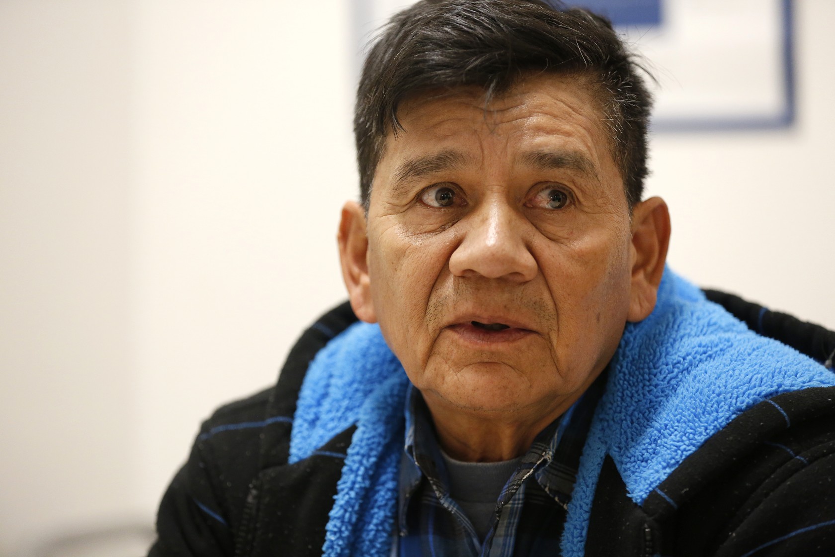 Pedro Castillo Bravo sits in a Removal Operations Processing Center in downtown Los Angeles after Immigration and Customs Enforcement agents made early morning arrest on March 17, 2020. (Al Seib/Los Angeles Times)