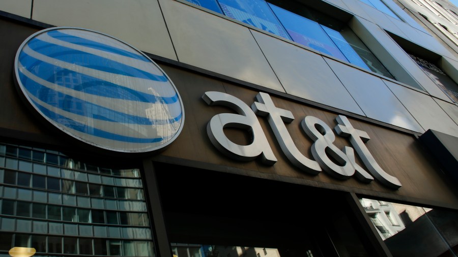 An AT&T sign at a store in New York City is seen in this file photo from Oct. 23, 2016. (KENA BETANCUR/AFP via Getty Images)