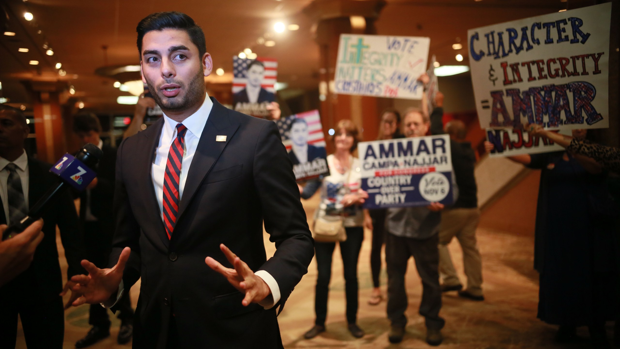 Ammar Campa-Najjar is seen with supporters in San Diego on Nov. 6, 2018. (Credit: Sandy Huffaker / Getty Images)