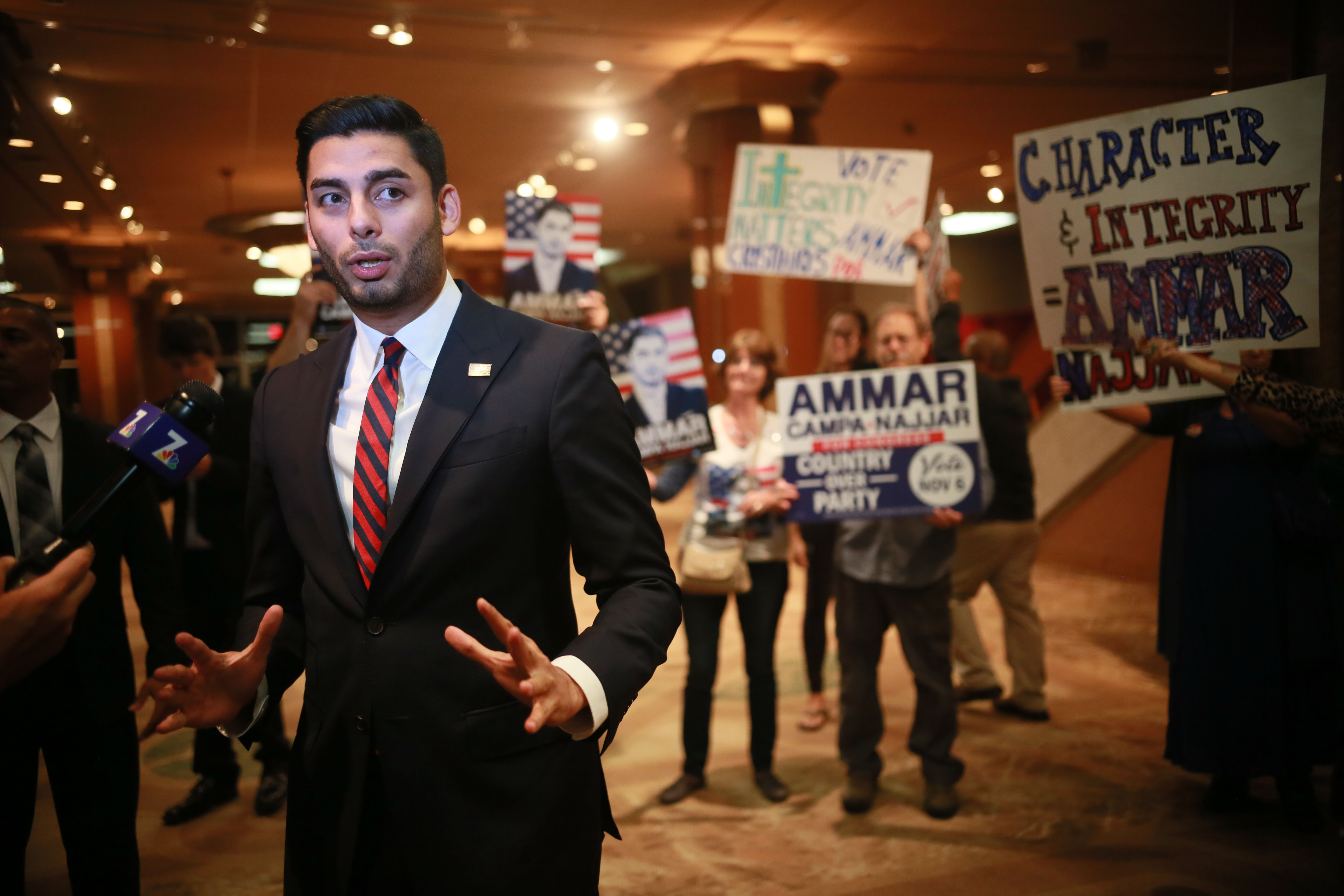 Ammar Campa-Najjar is seen with supporters in San Diego on Nov. 6, 2018. (Credit: Sandy Huffaker / Getty Images)