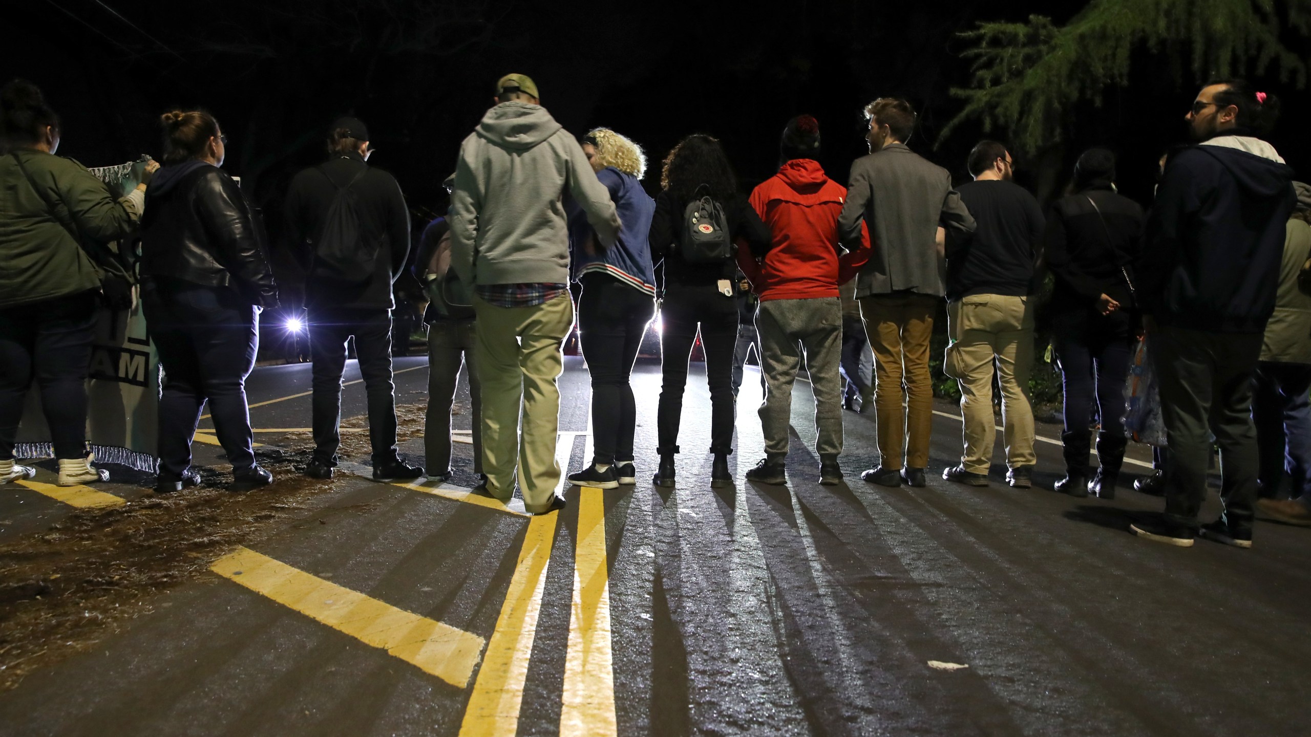 Black Lives Matter protesters block an intersection as they march through the streets of Sacramento on March 4, 2019, to demonstrate against the district attorney’s decision to not charge the police officers who shot and killed Stephon Clark. (Credit: Justin Sullivan / Getty Images)