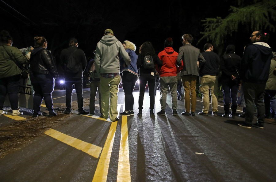 Black Lives Matter protesters block an intersection as they march through the streets of Sacramento on March 4, 2019, to demonstrate against the district attorney’s decision to not charge the police officers who shot and killed Stephon Clark. (Credit: Justin Sullivan / Getty Images)