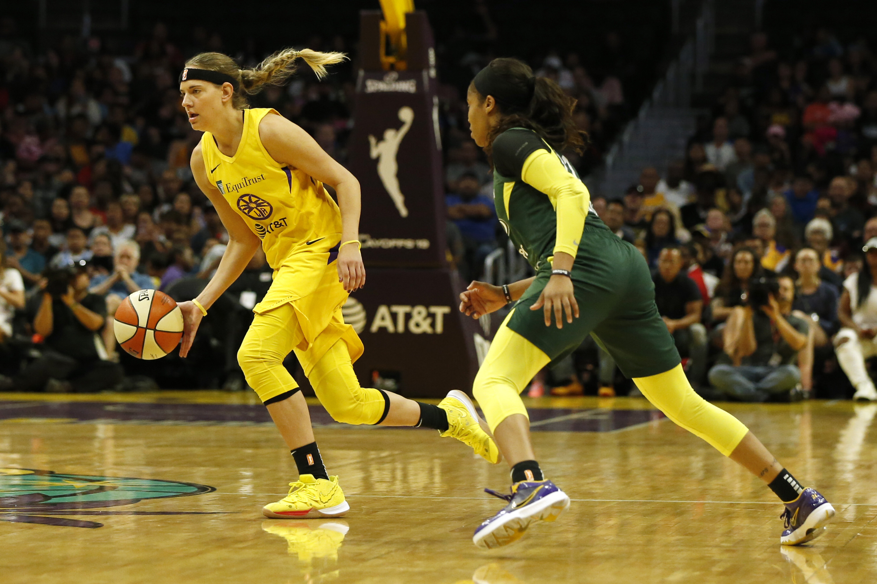 Guard Sydney Wiese #24 of the Los Angeles Sparks drives around guard Jordin Canada #21 of the Seattle Storm at Staples Center on Sept. 15, 2019. in Los Angeles. (Katharine Lotze/Getty Images)