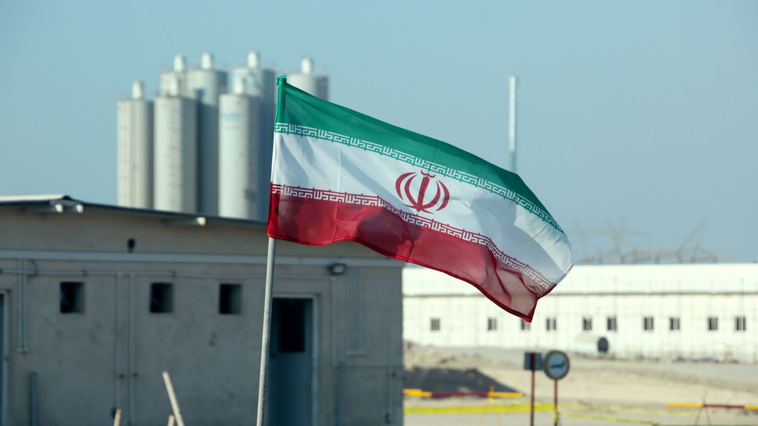 A picture taken on November 10, 2019, shows an Iranian flag in Iran's Bushehr nuclear power plant, during an official ceremony to kick-start works on a second reactor at the facility. (ATTA KENARE/AFP via Getty Images)