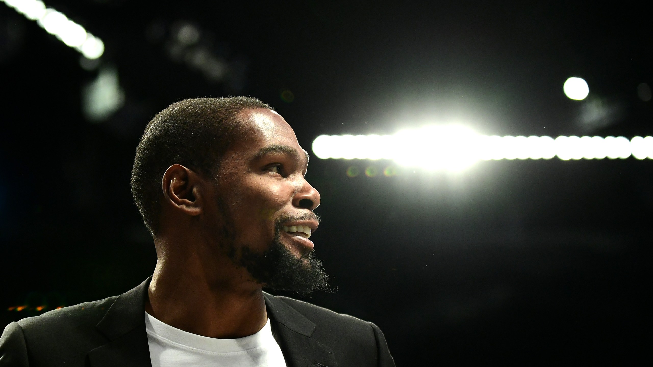 An injured Kevin Durant of the Brooklyn Nets stands on the sidelines during a game against the Minnesota Timberwolves at Barclays Center in Brooklyn on Oct. 23, 2019. (Credit: Emilee Chinn / Getty Images)