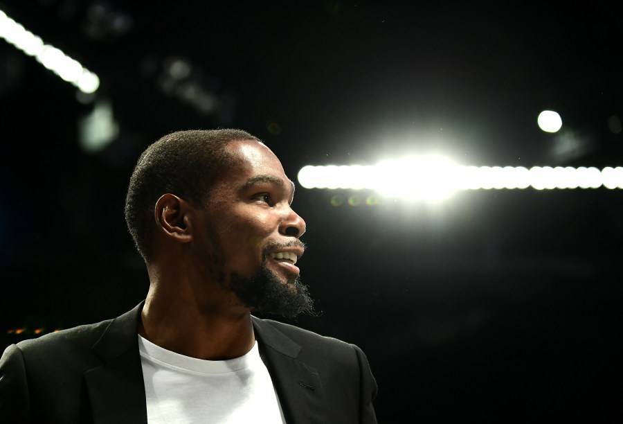 An injured Kevin Durant of the Brooklyn Nets stands on the sidelines during a game against the Minnesota Timberwolves at Barclays Center in Brooklyn on Oct. 23, 2019. (Credit: Emilee Chinn / Getty Images)