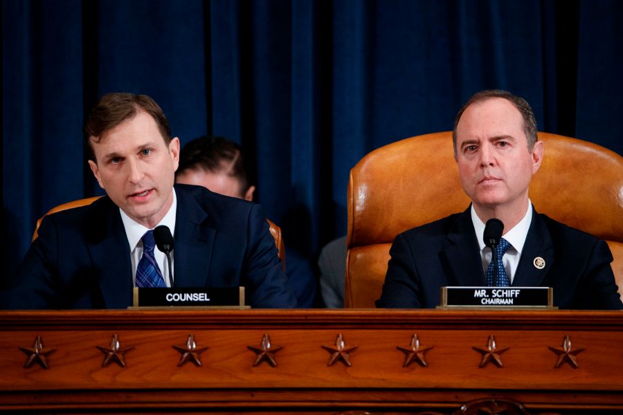 Democratic Chairman of the House Permanent Select Committee on Intelligence Adam Schiff (R) listens as Democratic legal counsel Daniel Goldman (L) questions Director for European Affairs of the National Security Council, U.S. Army Lieutenant Colonel Alexander Vindman during the House Permanent Select Committee on Intelligence public hearing on the impeachment inquiry into President Donald J. Trump, on Capitol Hill in Washington,DC on Nov. 19, 2019. (SHAWN THEW/POOL/AFP via Getty Images)