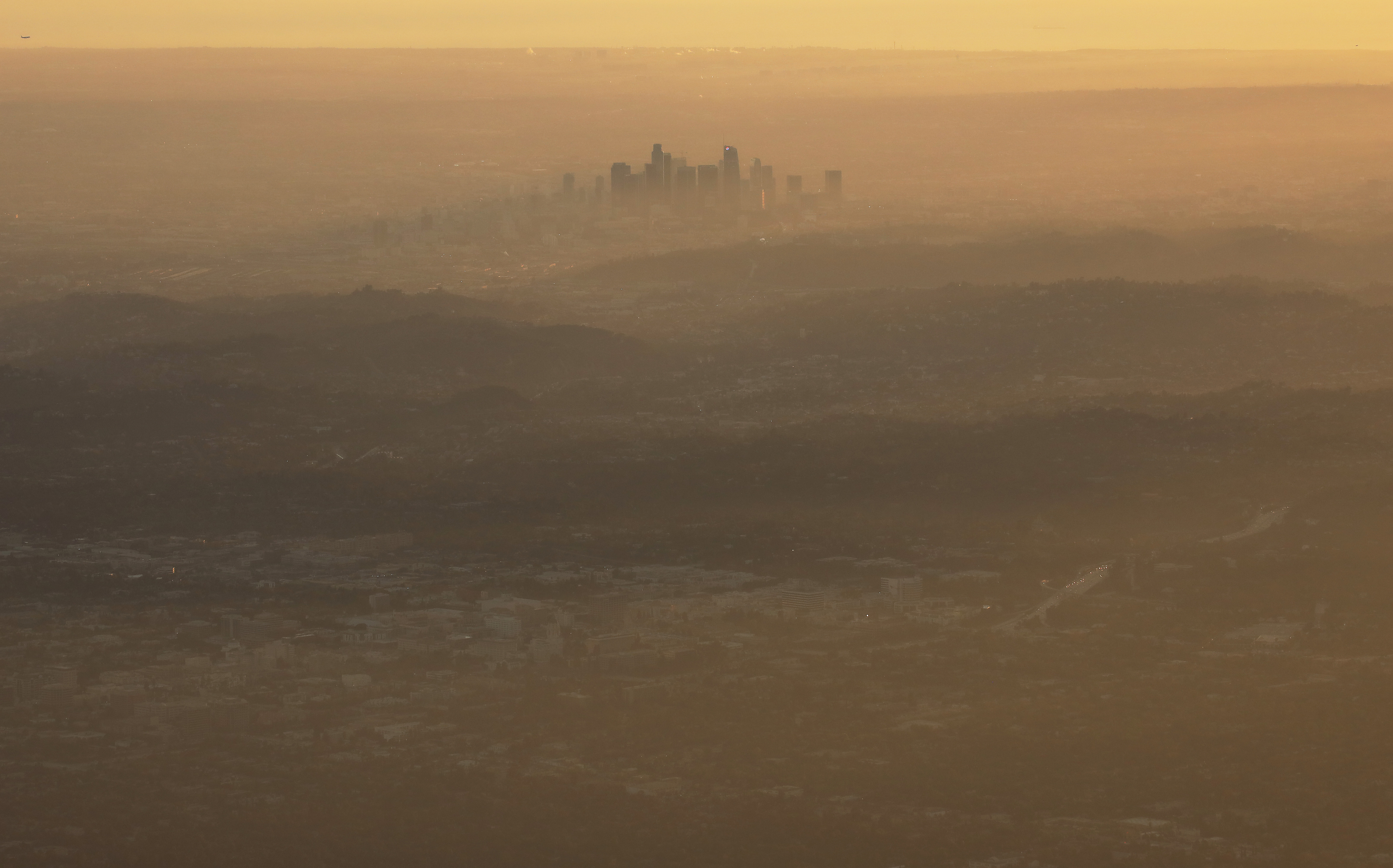 The buildings of downtown Los Angeles are partially obscured in the late afternoon on Nov. 5, 2019 as seen from Pasadena. (Mario Tama/Getty Images)