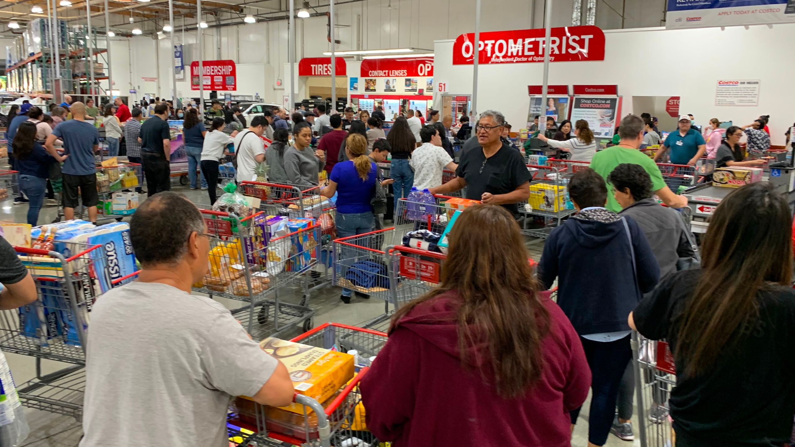 Shoppers buy toilet paper, food and water at a Los Angeles Costco, as people begin to panic buy and stockpile essentials from fear that supplies will be affected by the spread of the coronavirus. (MARK RALSTON/AFP via Getty Images)