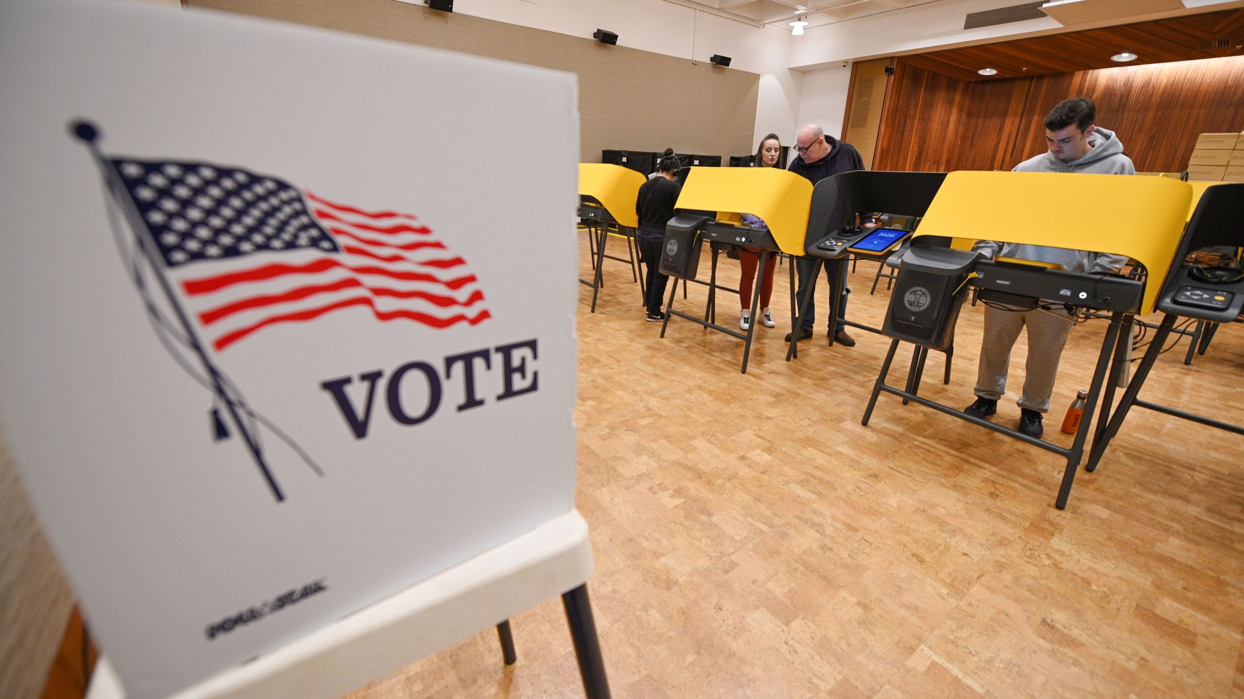 People cast their ballot during the presidential primary vote in Glendale on Super Tuesday, March 3, 2020. (ROBYN BECK/AFP via Getty Images)