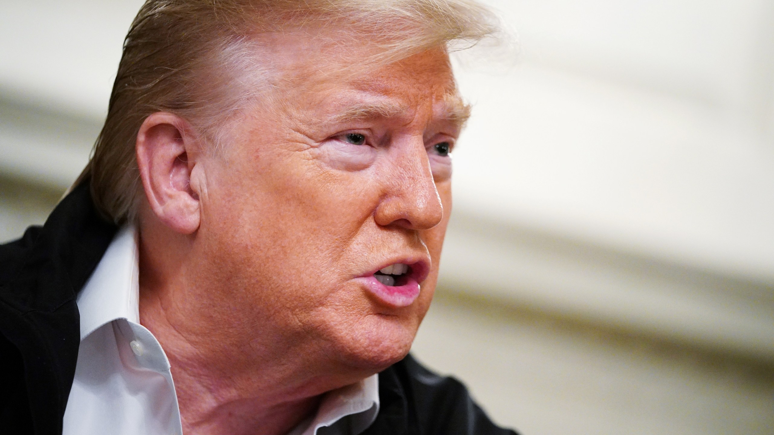 U.S. President Donald Trump speaks to the press after signing an $8 billion emergency funding bill to combat COVID-19, coronavirus, in the Diplomatic Room of the White House in Washington, D.C., on March 6, 2020. (MANDEL NGAN/AFP via Getty Images)