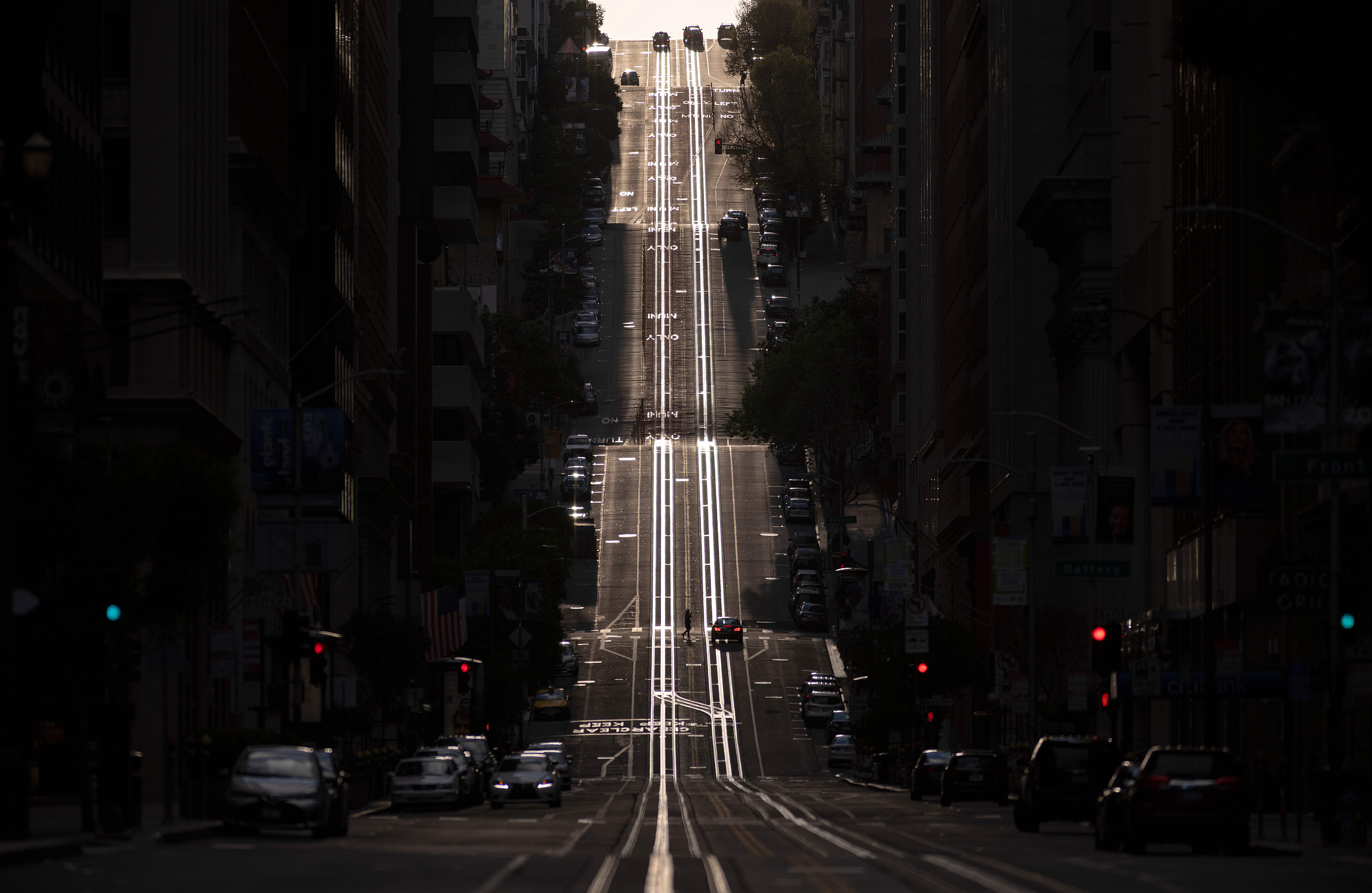 A street usually filled with cable cars is seen empty in San Francisco on March 18, 2020. (Josh Edelson/AFP via Getty Images)