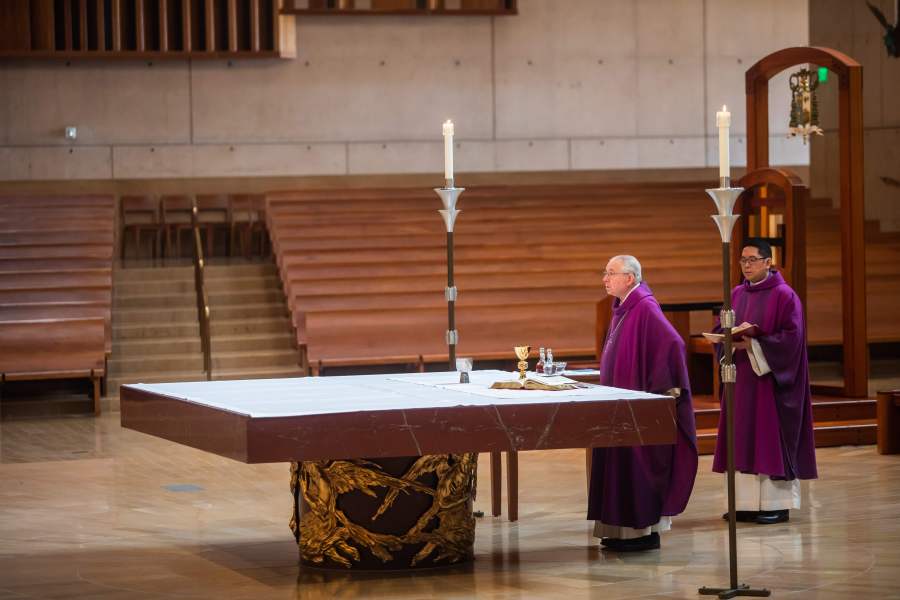 Archbishop Jose H. Gomez leads an online Sunday Service at the Cathedral of Our Lady of the Angels in downtown Los Angeles on March 22, 2020, after the church shut its doors to the public. (Credit: Apu Gomes / AFP / Getty Images)