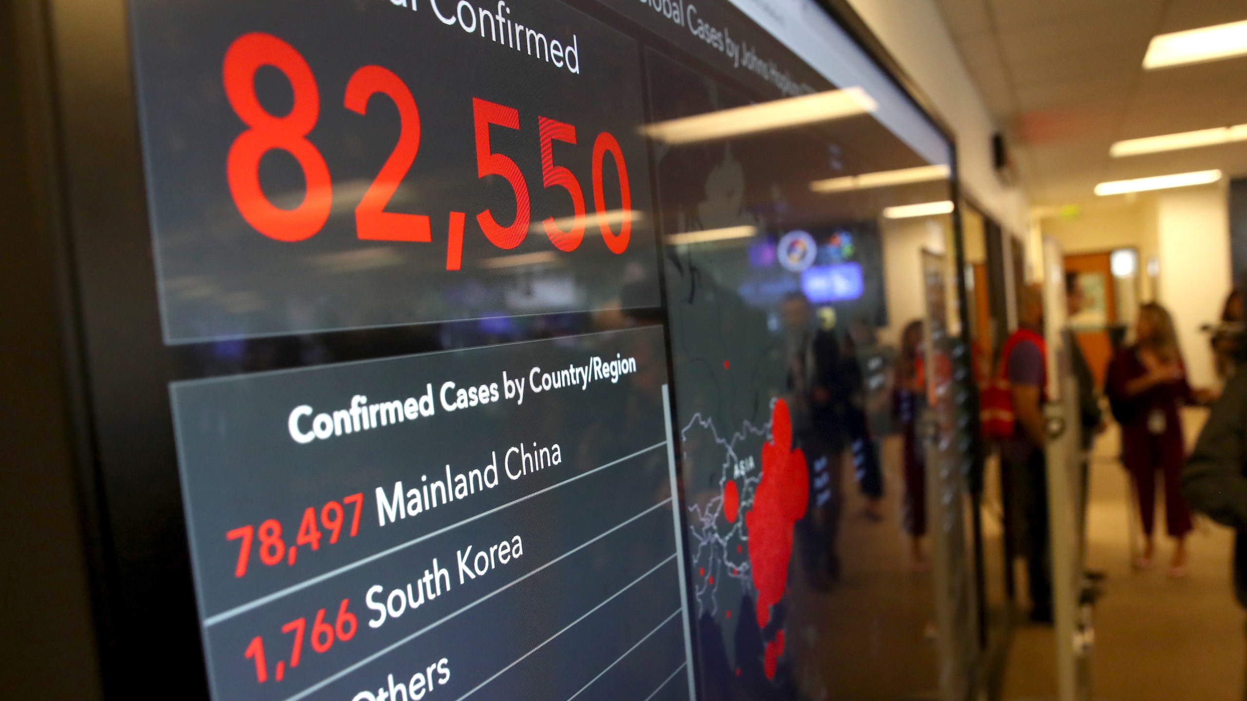 A video monitor inside the Medical Health and Coordination Center at the California Department of Public Health shows the number of Coronavirus COVID-19 cases around the world on Feb. 27, 2020, in Sacramento. ( Justin Sullivan/Getty Images)