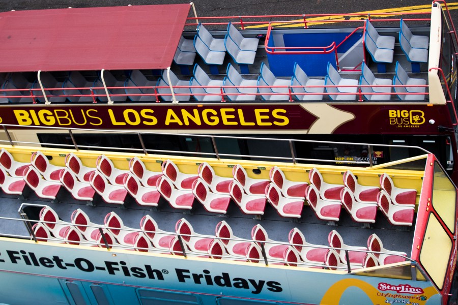 Empty tour buses are seen on March 13, 2020 in Hollywood. (Rich Fury/Getty Images)