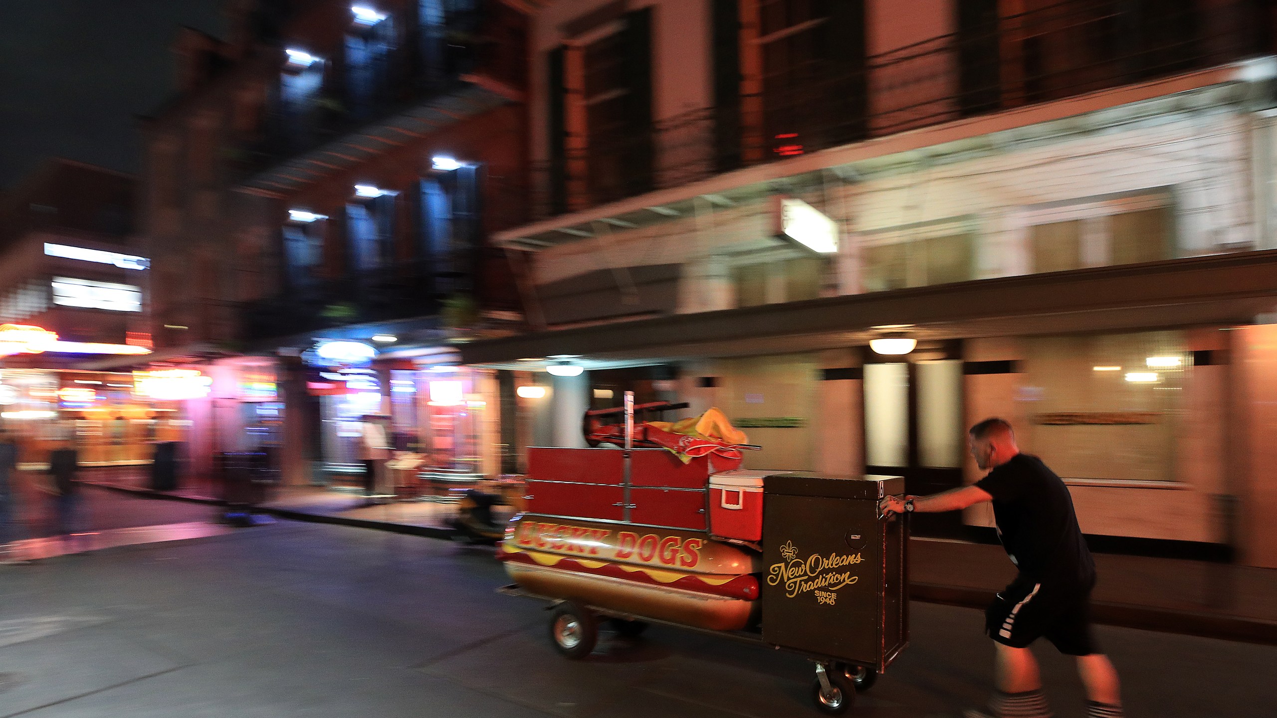 A Lucky Dog vendor leaves Bourbon Street as Louisiana Governor John Bel Edwards orders bars, gyms and casinos to close until April 13th due to the spread of coronavirus on March 16, 2020, in New Orleans, Louisiana. (Chris Graythen/Getty Images)