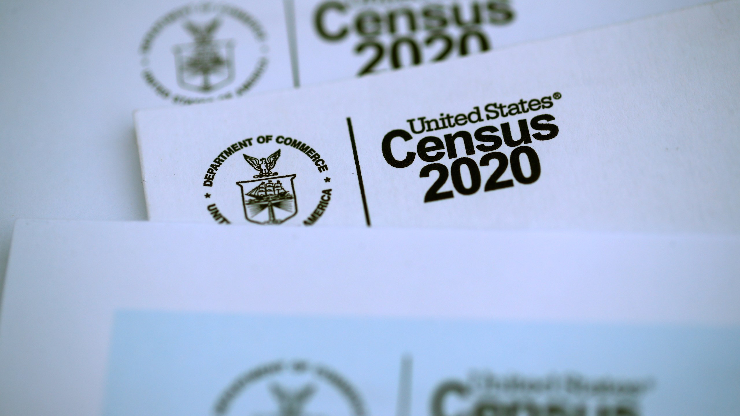 The U.S. Census logo appears on census materials received in the mail with an invitation to fill out census information online on March 19, 2020, in San Anselmo, California. (Justin Sullivan/Getty Images)